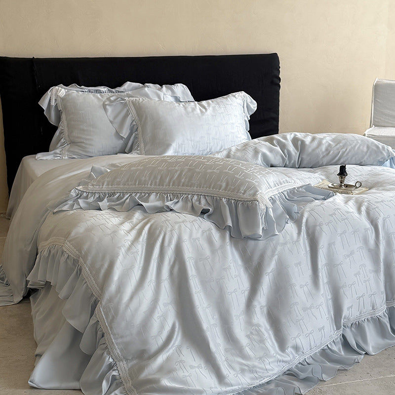 Luxurious satin bedding set with ruffles and fine bow jacquard
