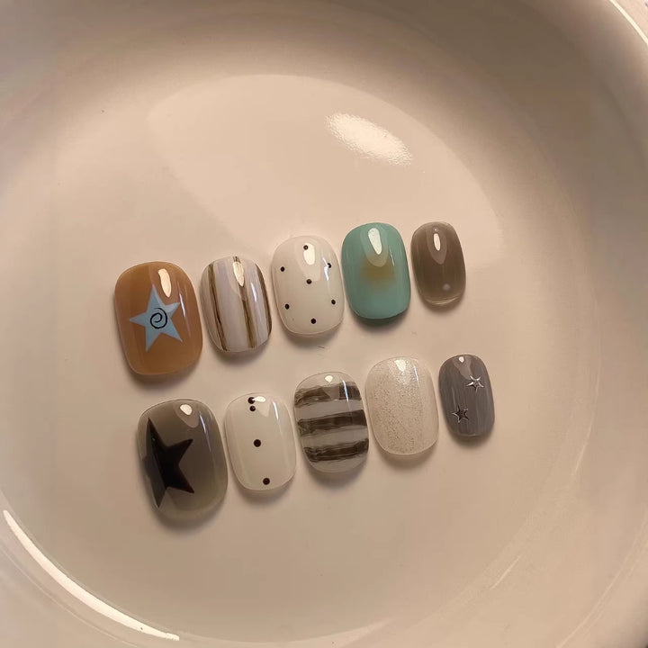 Artistic Press-On Nail Set with Geometric and Star Designs