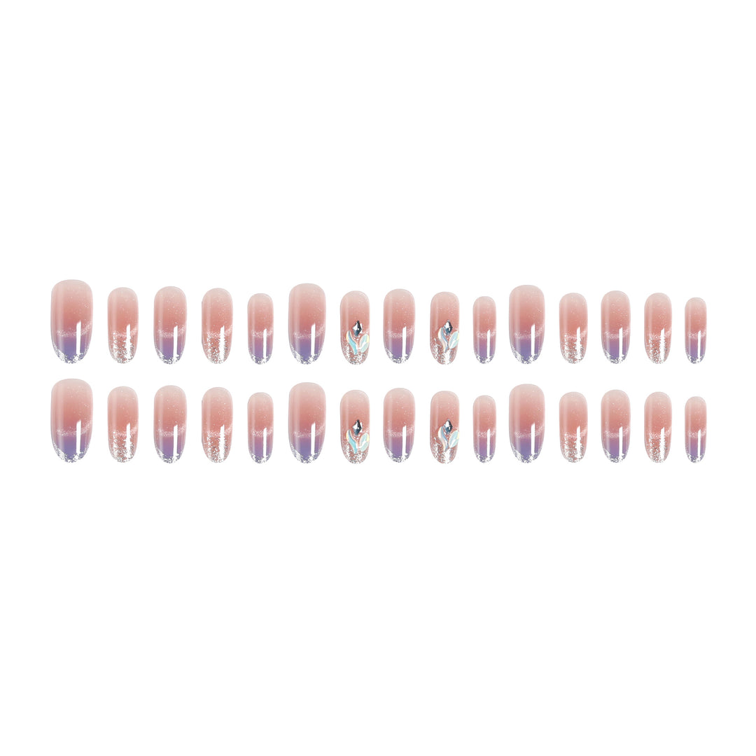 Acrylic nail set with elegant glitter effect and beautified embellishments Kalsten