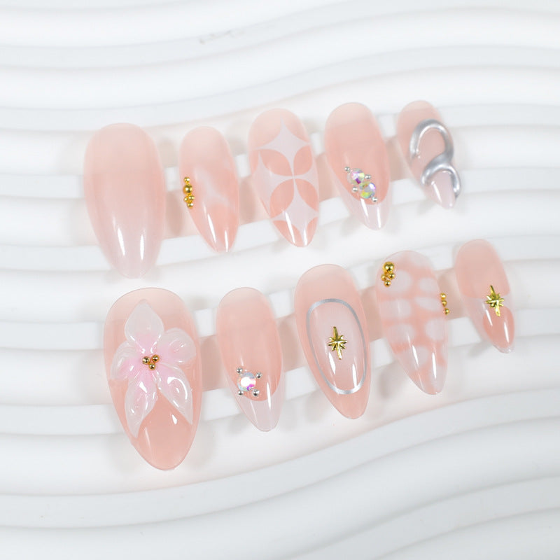 Acrylic nail set with romantic flowers and elegant design elements Kalsten