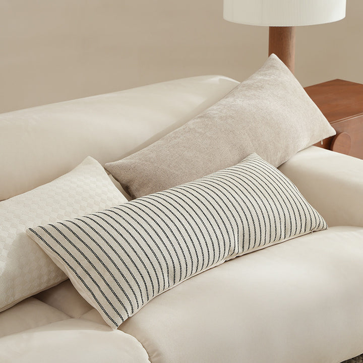 Long decorative lumbar roll made of textured linen fabric