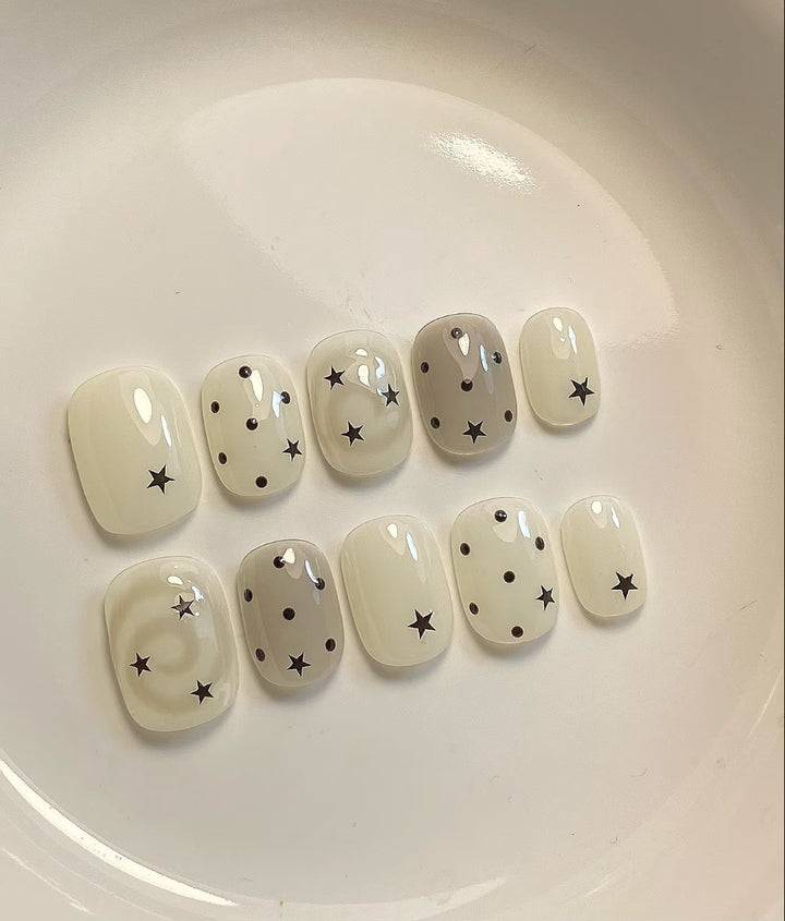 Artistic Press-On Nail Art Set with Star and Grid Designs