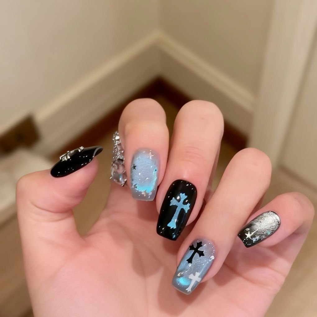 Artistic Press-On Nail Art with Cross and Star Designs