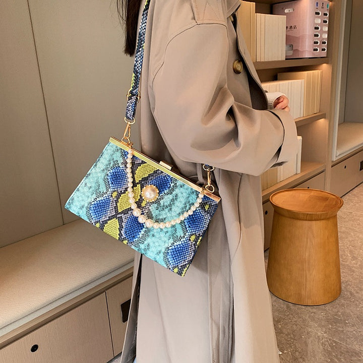 Elegant Pearl-Embellished Snakeskin Clutch Bag