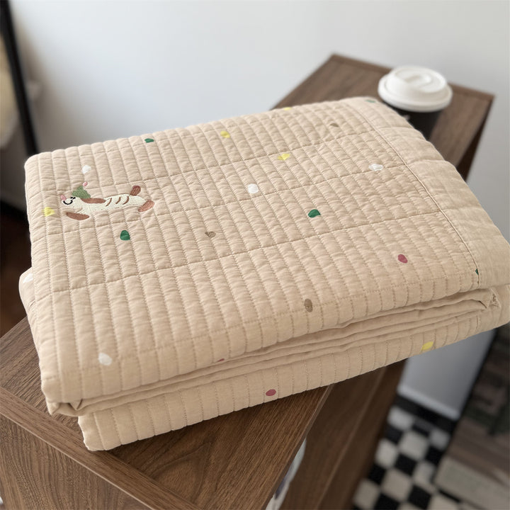 Quilted cotton bedspread with fine striped texture and cherry embroidery