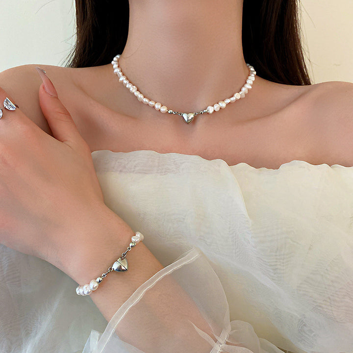 Elegant silver pearl bracelet with heart details Kalsten