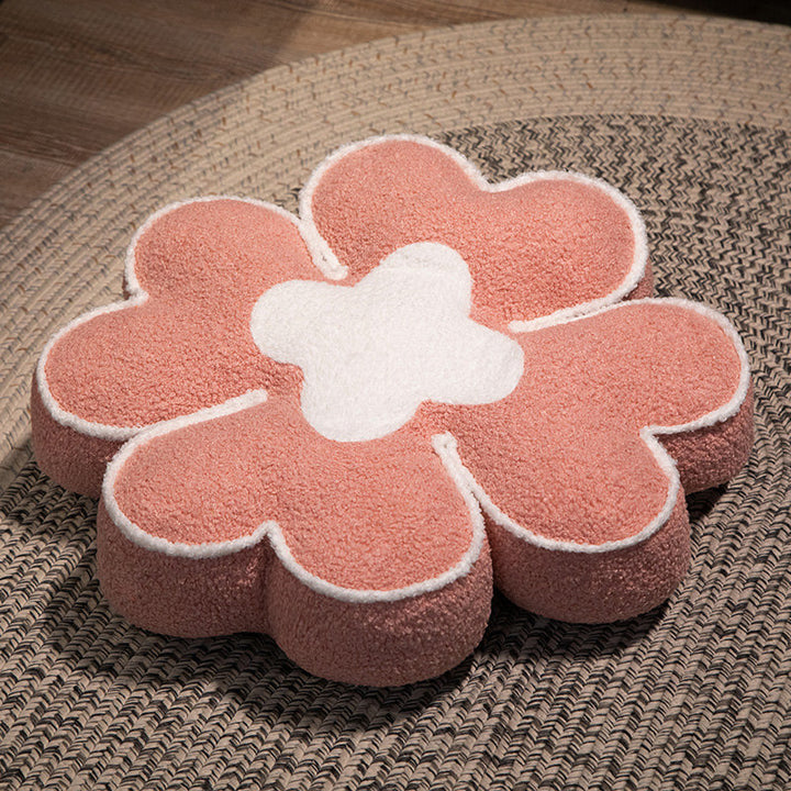 Padded seat cushion in flower shape with faux leather center piece and fluffy edge padding
