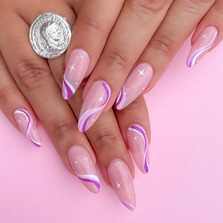 Elegant artistic nail extensions with delicate gradient and accented lines Kalsten