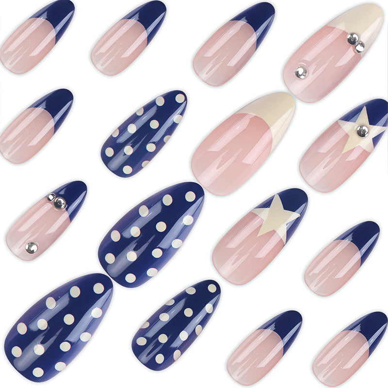 Artistic Nail Design with Star and Polka Dot Accents Kalsten