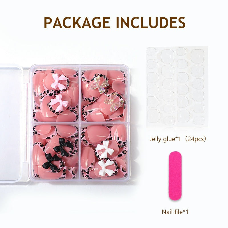 Artificial nail set with impressive floral and bow accents Kalsten