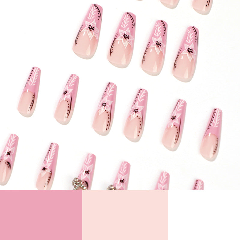 Artistic nail art with flower and heart motifs Kalsten