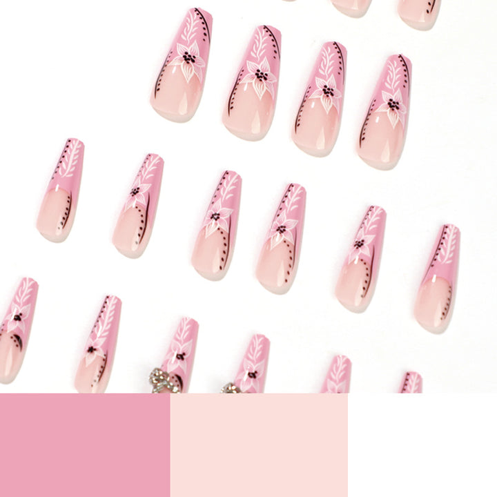 Artistic nail art with flower and heart motifs Kalsten