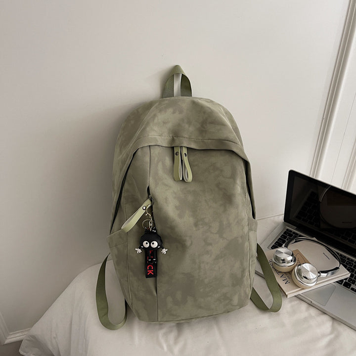 Fashionable backpack with practical design and decorative pendant Kalsten