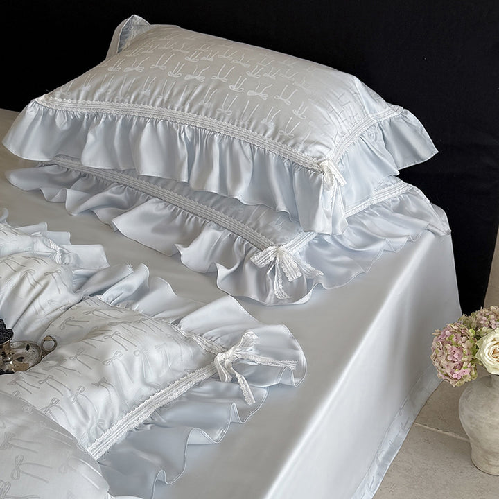 Luxurious satin bedding set with ruffles and fine bow jacquard