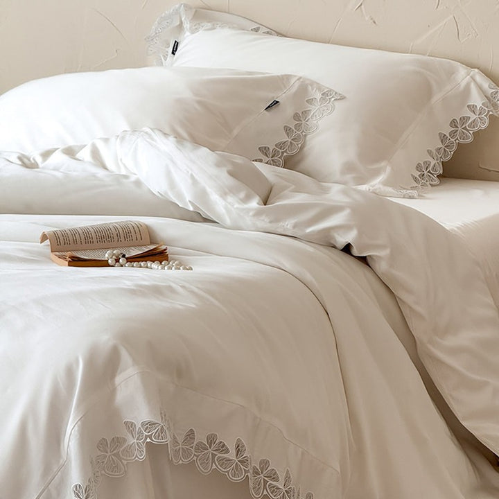 Luxurious cotton satin bed linen set with fine lace border