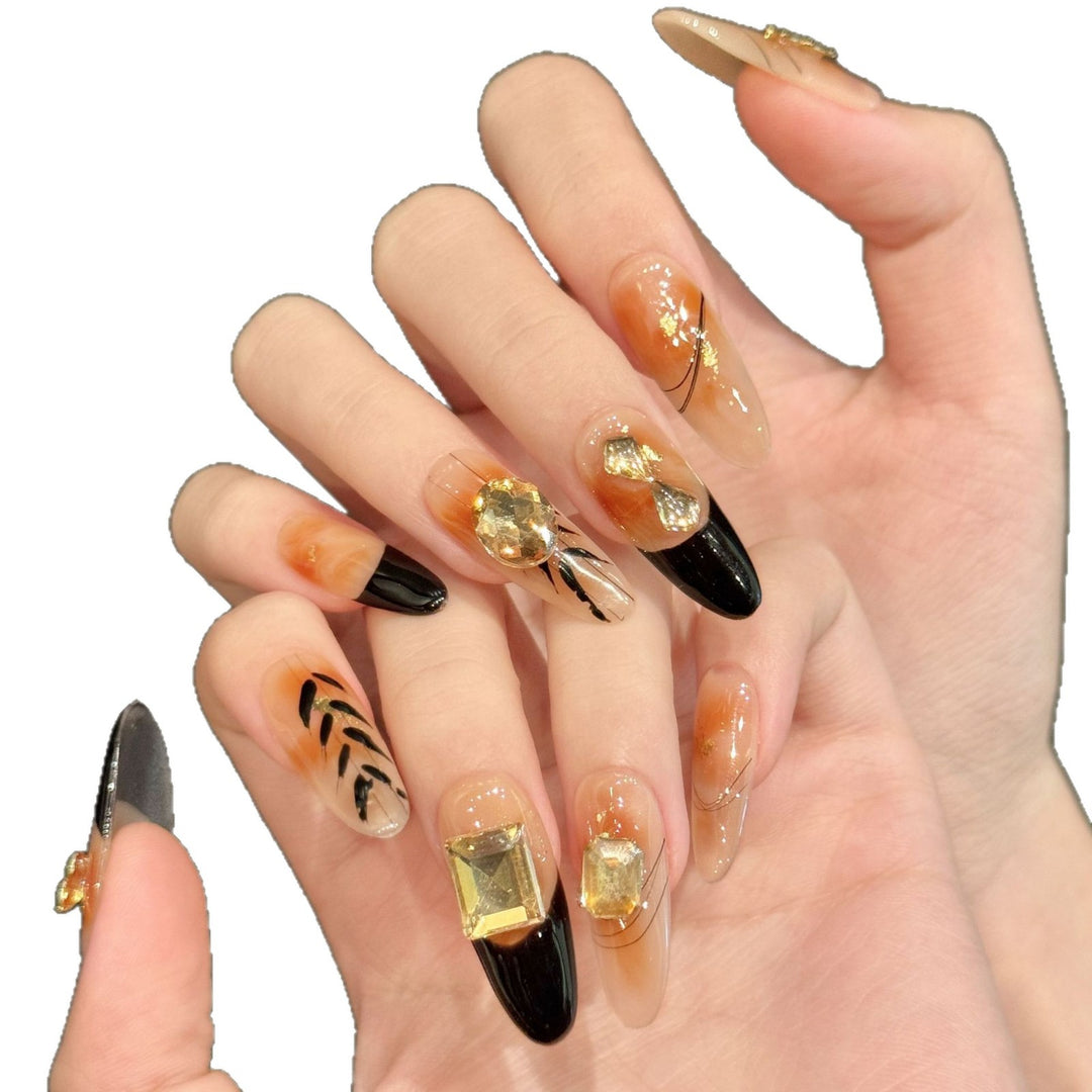 Artistic Gel Press-On Nails with Geometric and Gem Accents