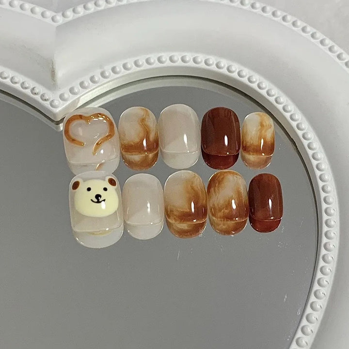 Artificial nails with cute bear design and elegant color gradients Kalsten