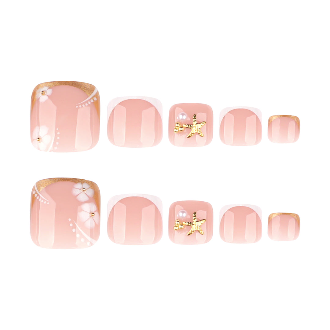 Artful toenail art with delicate flower and glitter accents Kalsten