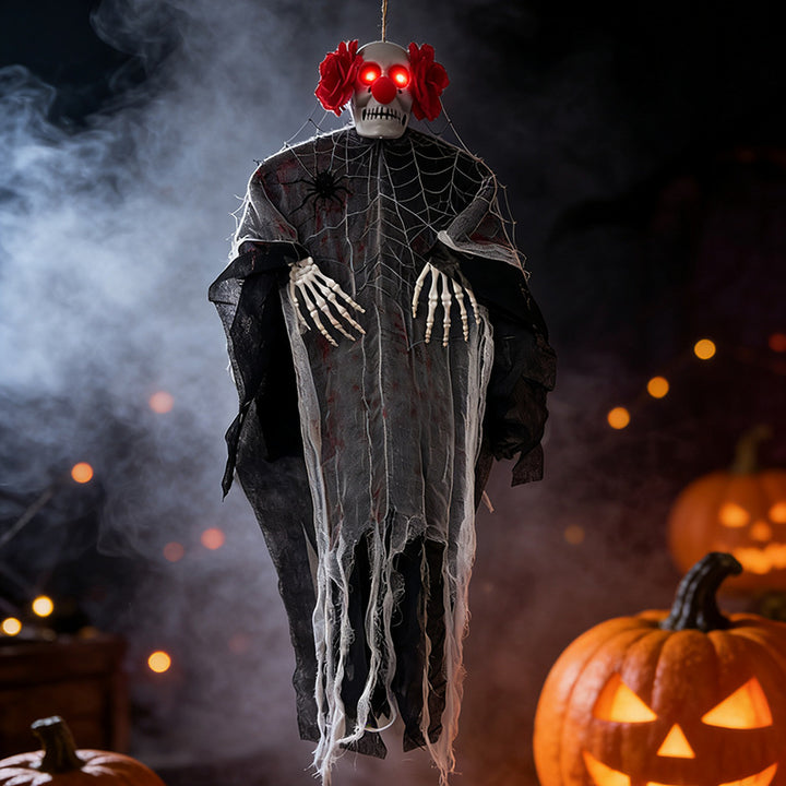 Creepy hanging decoration skeleton with glowing eyes