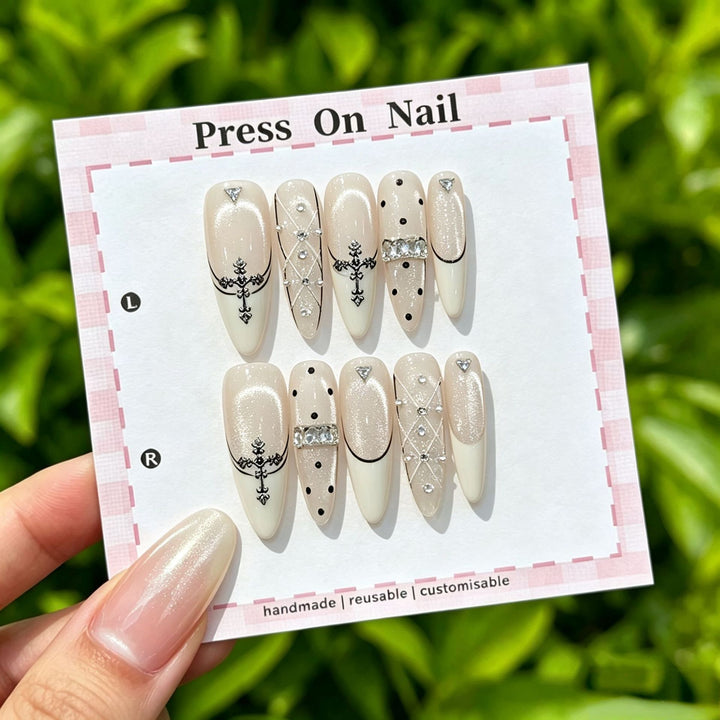 Artistic Press-On Nail Art Set with Cute Character and Bow Accents