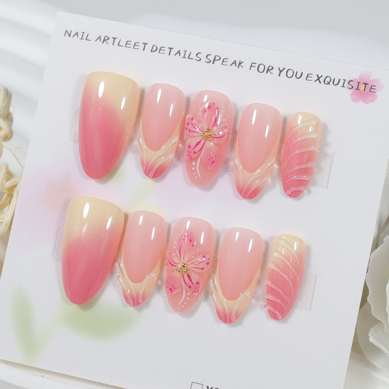 Artificial nail set with delicate floral designs and modern ombre effects Kalsten