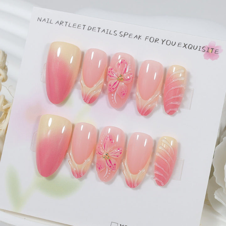 Artificial nail set with delicate floral designs and modern ombre effects Kalsten