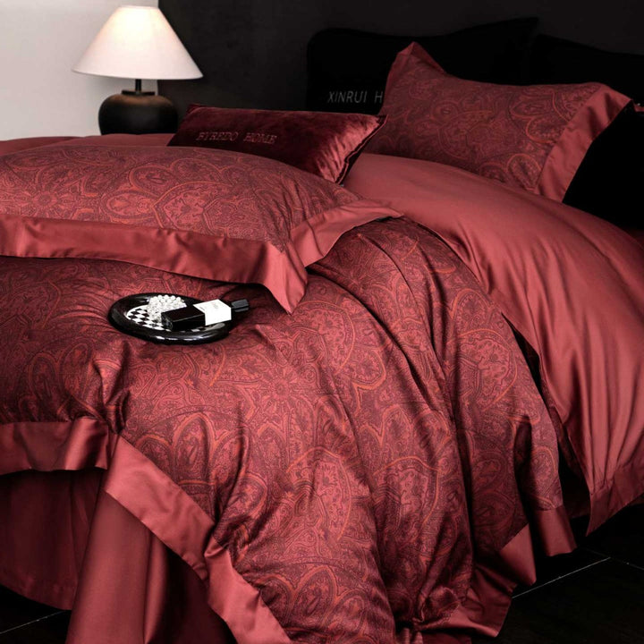 Reversible cotton satin bedding set with floral jacquard, contrast piping and decorative cushion