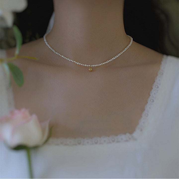 Delicate pearl necklace with elegant gold accent chain Kalsten