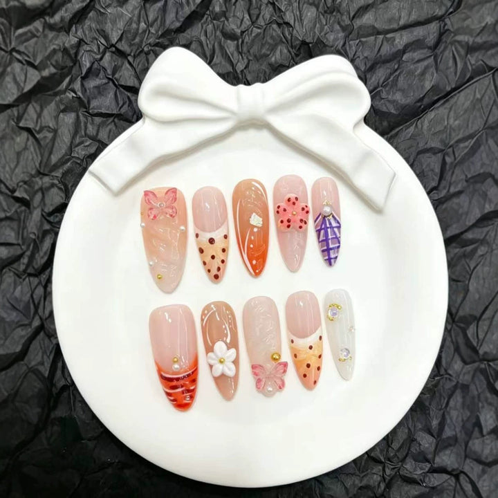 Artistic Press-On Nails Set with Floral and Decorative Accents