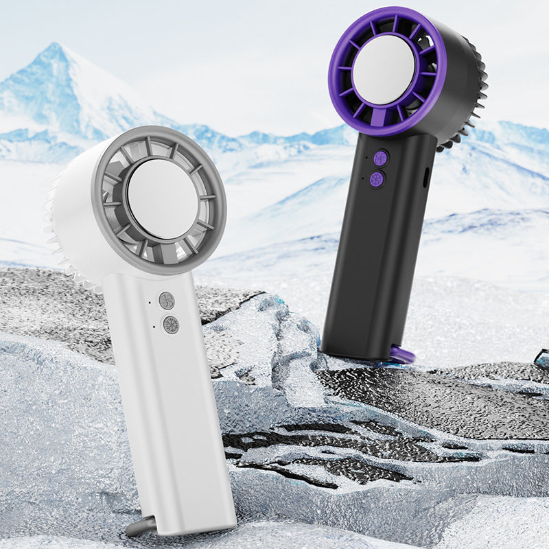 Cooling portable handheld evaporative mister fan with tri-speed adjustable airflow and foldable desktop stand Kalsten