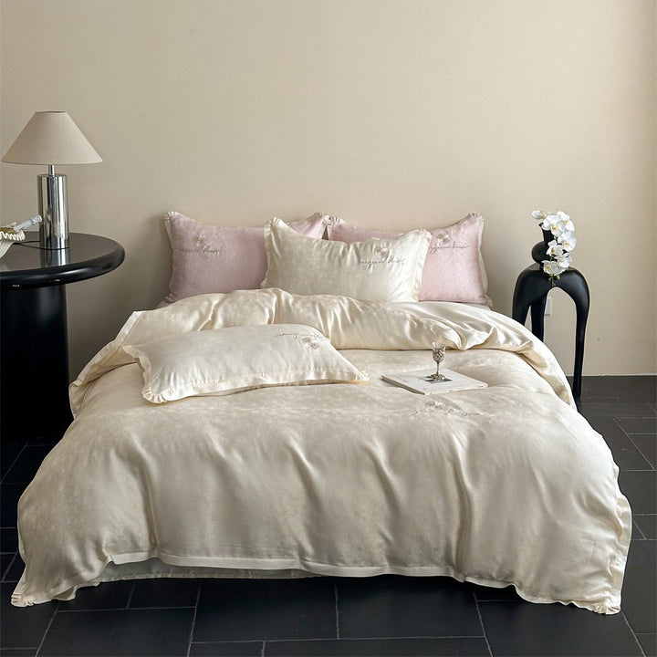Luxurious cotton satin bedding set with jacquard relief and embroidered rose motif