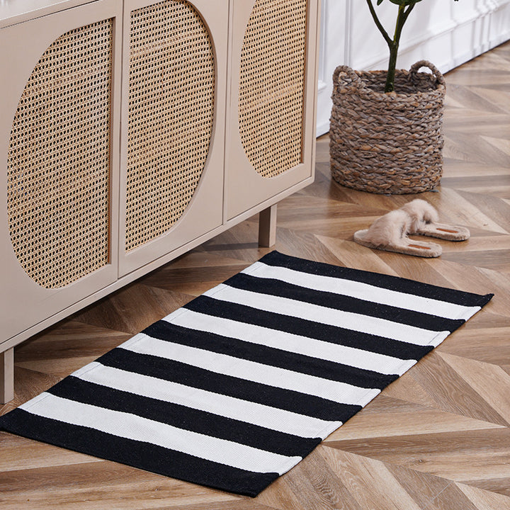 woven living room runner with fringes and geometric weave pattern
