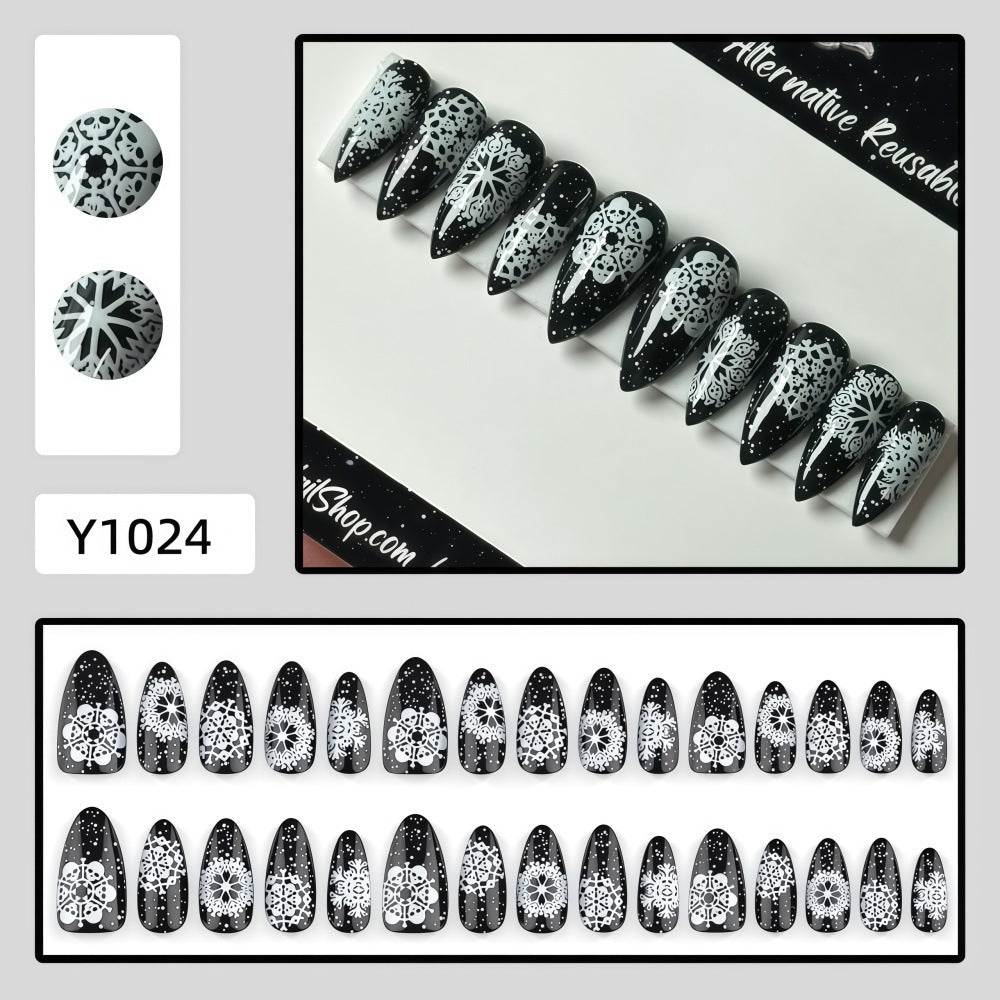 Artificial nails in a unique winter design with snow and reindeer motifs Kalsten