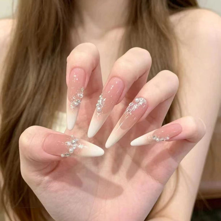 Elegant Stiletto Nail Extensions with Crystal Accents