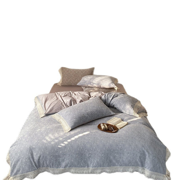 Reversible cotton satin bedding set with fine jacquard structure and lace trim