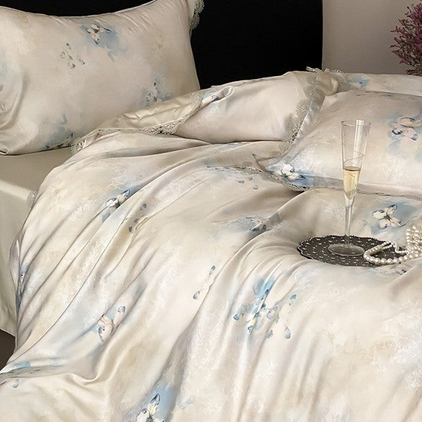 Premium bedding made of fine satin with watercolored floral design and lace edge