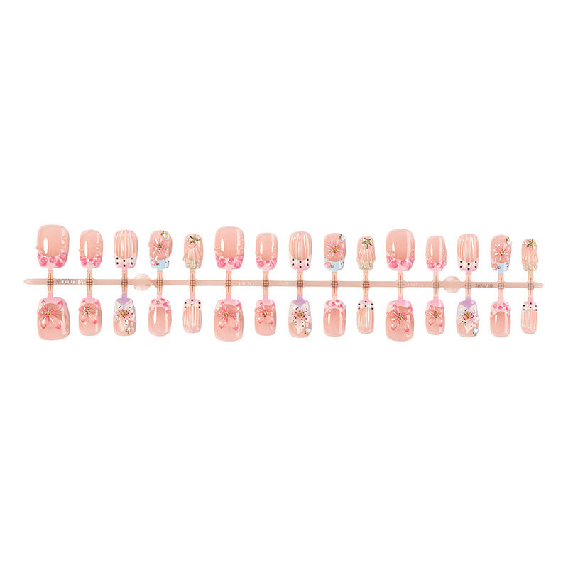 Artificial nail set with floral designs and elegant glitter elements Kalsten