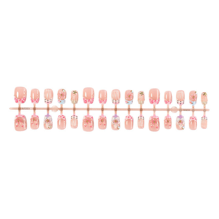 Artificial nail set with floral designs and elegant glitter elements Kalsten