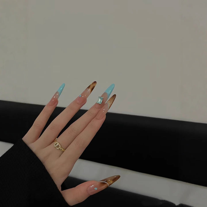 Elegant Stiletto Nail Extensions with Glitter Accents