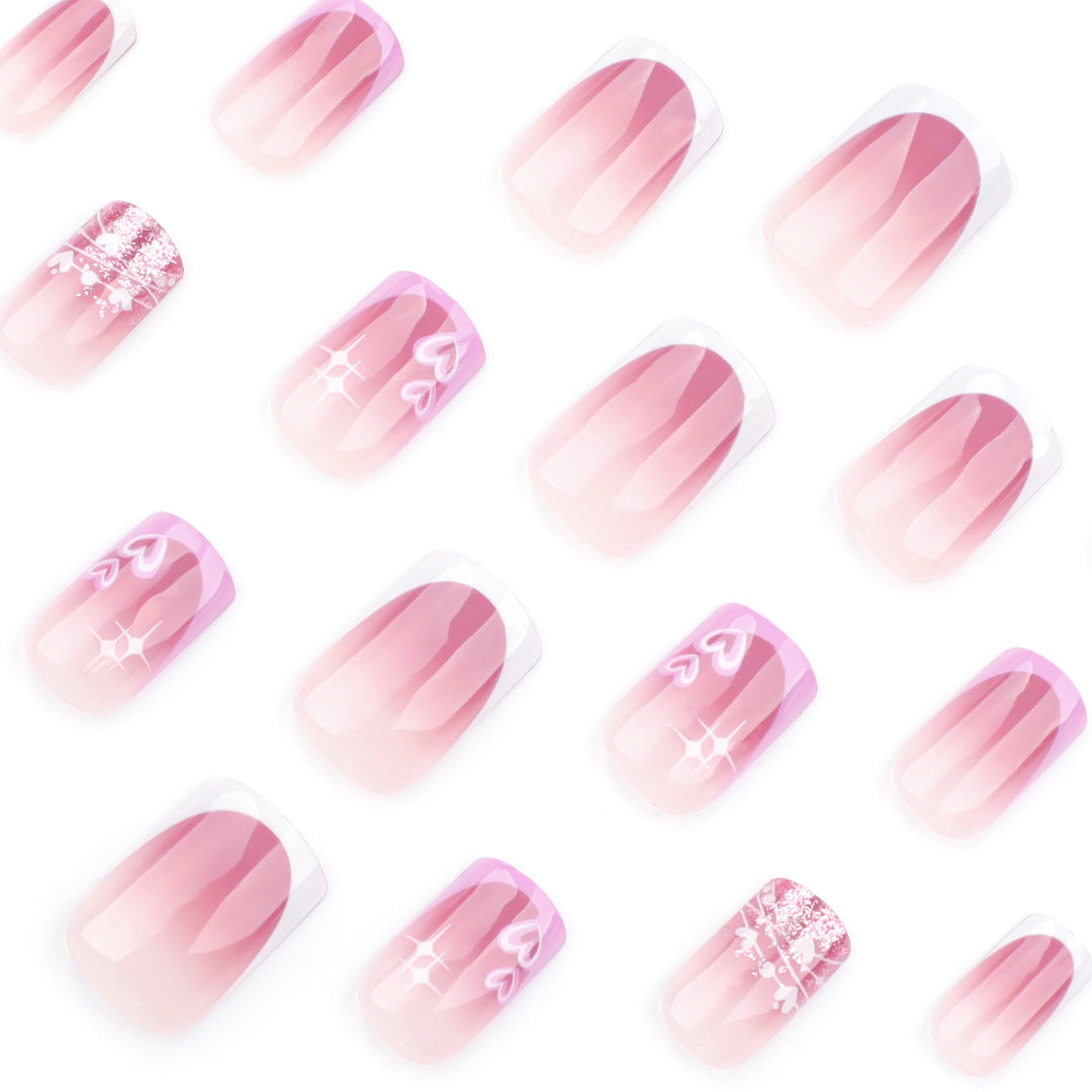 Artful Nail Art with Heart and Glitter Motifs Kalsten