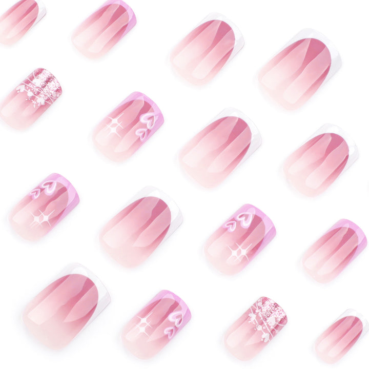 Artful Nail Art with Heart and Glitter Motifs Kalsten