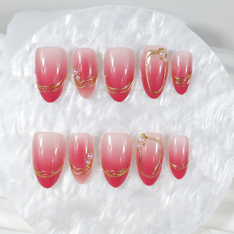 Acrylic nail set with elegant ombré designs and glitter accents Kalsten