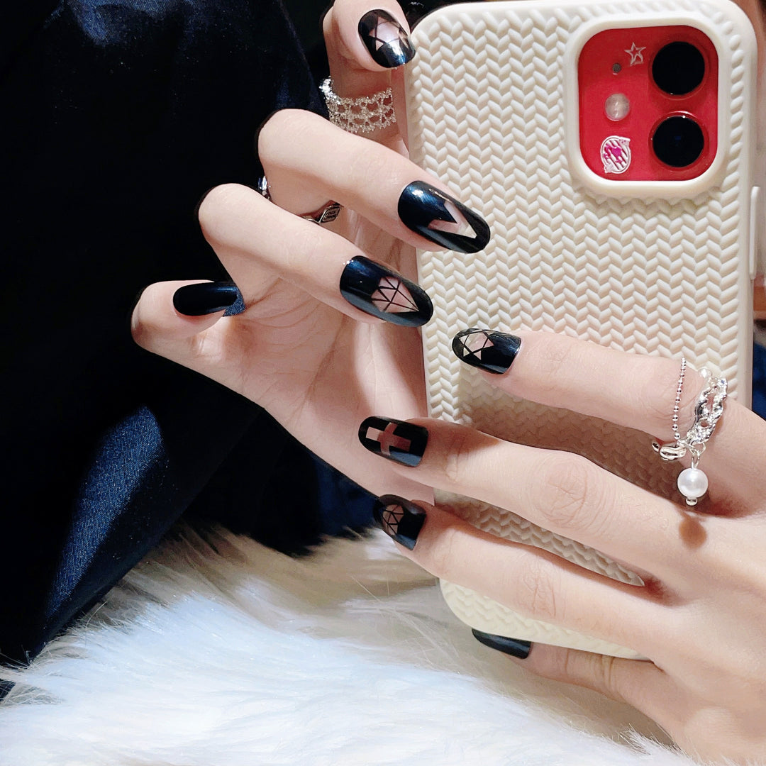 Artistic Press-On Nail Set with Geometric and Symbolic Designs