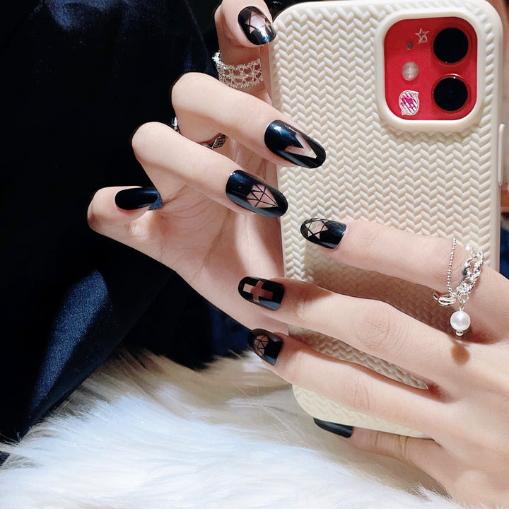 Artistic Press-On Nail Set with Geometric and Symbolic Designs