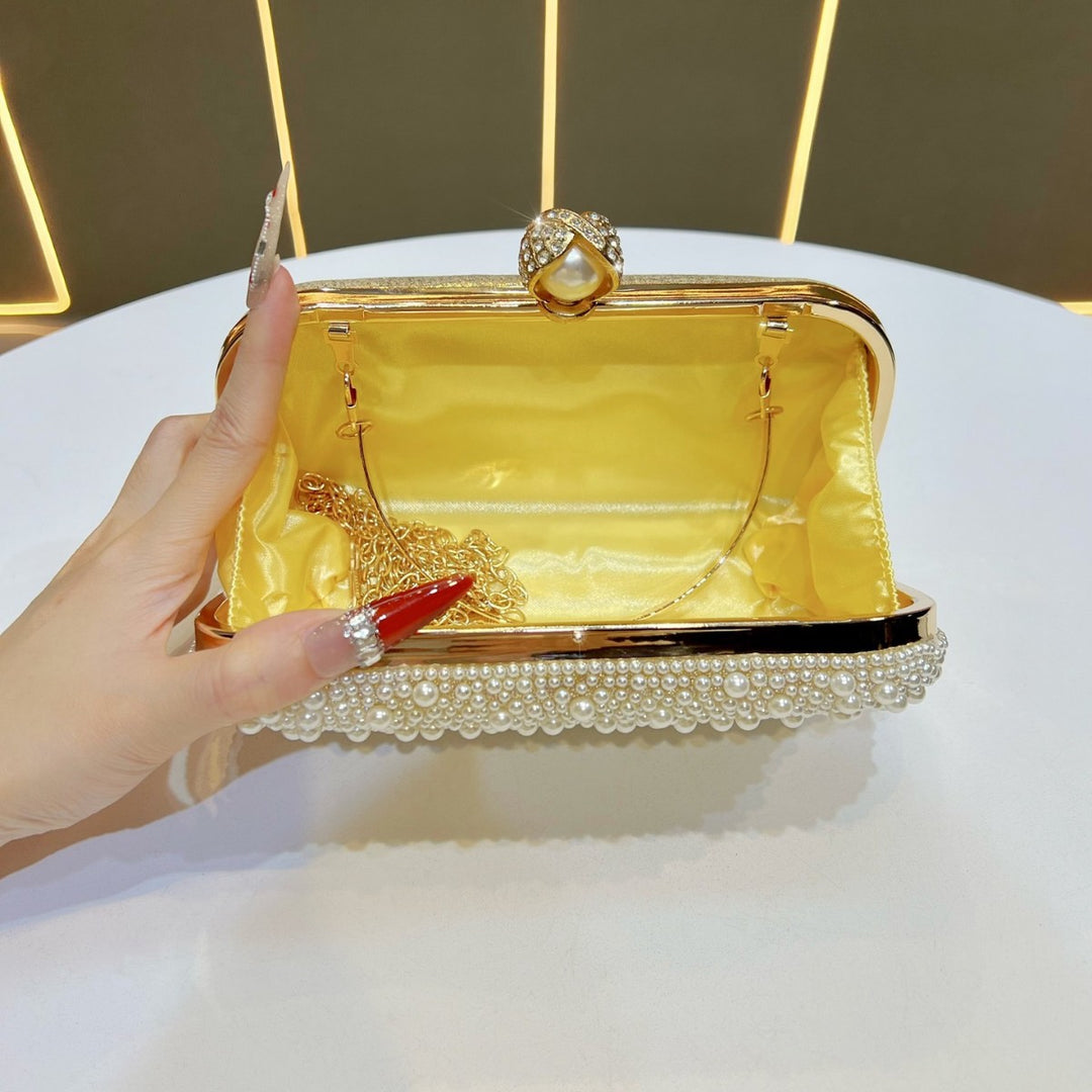 Decorative Pearl Clutch with Gold Accents