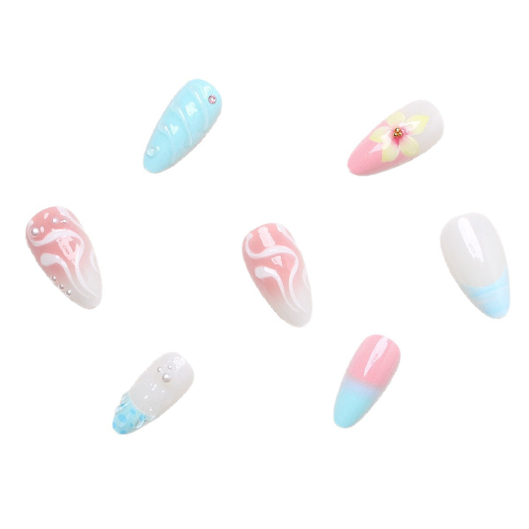 Artificial nail set with floral and shell-shaped designs Kalsten