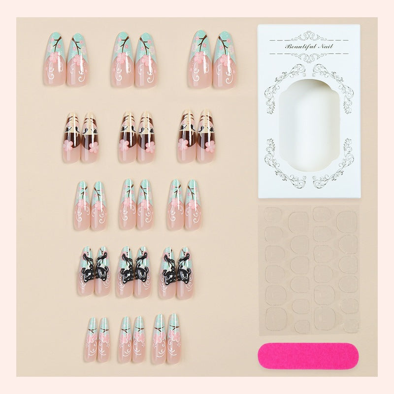 Artificial nail set with blooming floral design by Kalsten