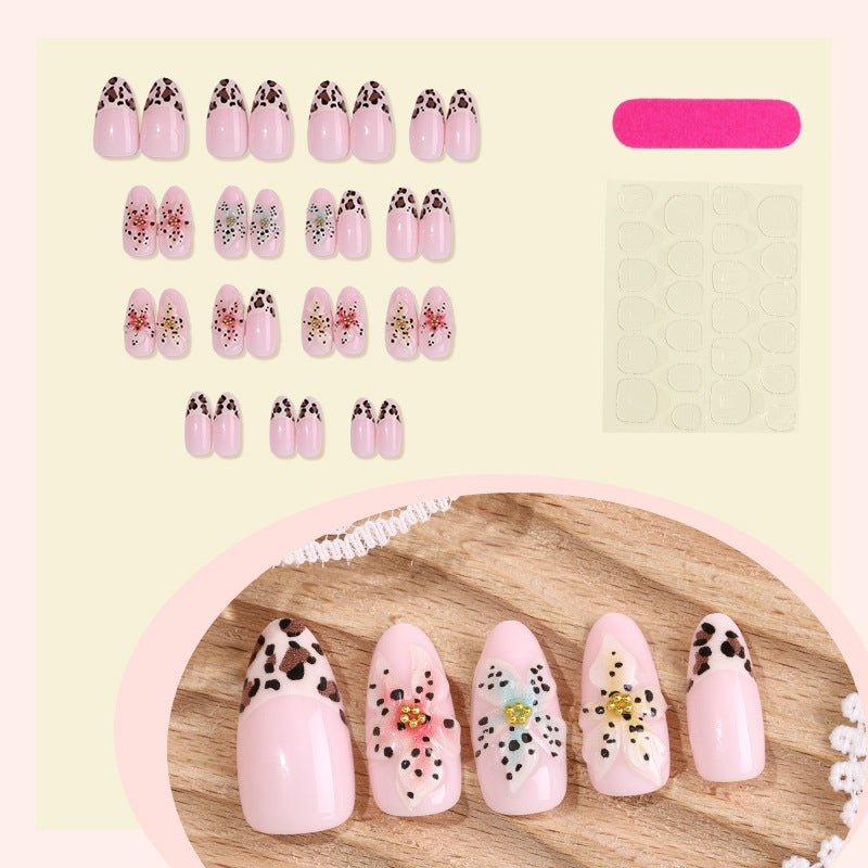 Artificial nail set with exquisite floral design and creative glitter accents Kalsten