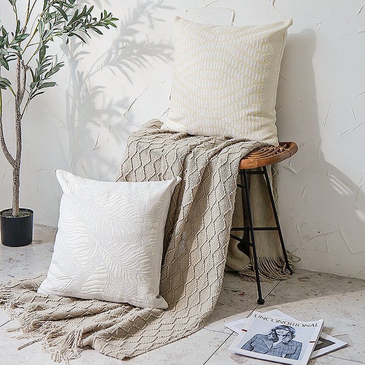Square sofa decorative cushion with fine woven relief structure and central circle ornament