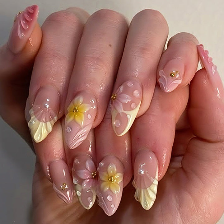Elegant artificial nail set with floral and glamorous accents Kalsten